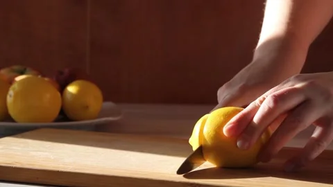 Female hands breaking and beating an egg in the kitchen Stock Footage 142758614