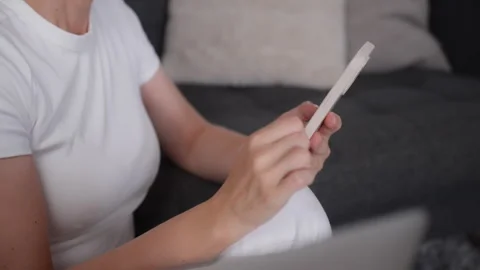 Female hands browsing online stores on smartphone in close-up. Mobile shopp.. Stock Footage 339622894