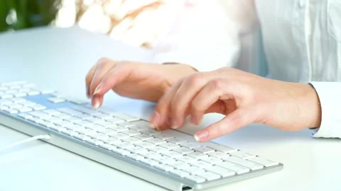 Female hands busy working on computer keyboard for sending emails Stock Footage 208397221