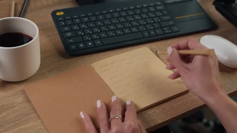 Female hands checking completed tasks Stock Footage 266248880