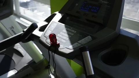 Female hands configure treadmill Stock Footage 87654648