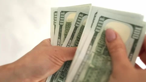 Female hands count dollars. point of view. dollar bills close-up. money in hand. Stock Footage 244471796