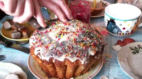 Female hands cut Easter cake. Stock Footage 67831415