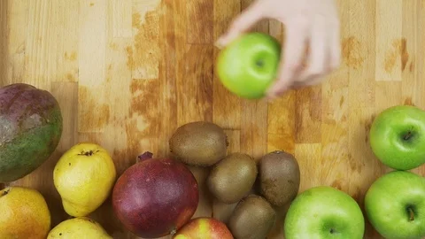 Female hands cutting apple 스톡 동영상 78488064