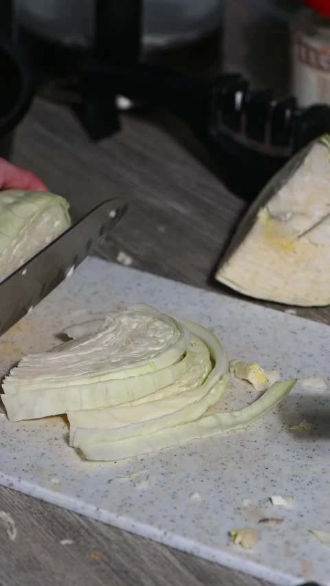 Female Hands Cutting Fresh Cabbage, Healthy Cooking Close Up Stock Footage 330970390
