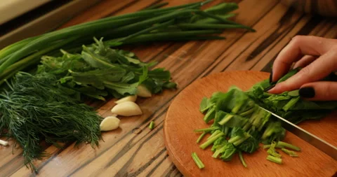 Female hands cutting spinach Stock Footage 244072854