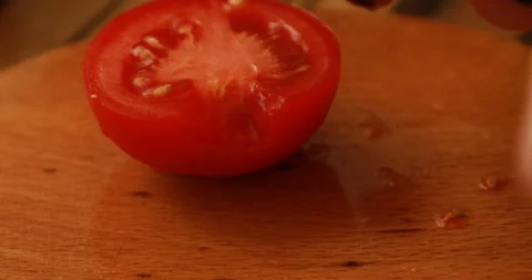 Female hands cutting tomatoes Stock Footage 244076016
