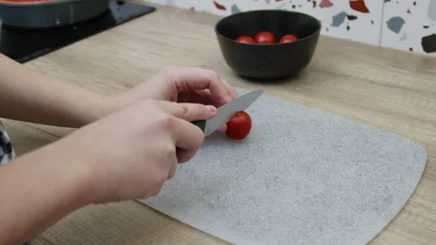 Female hands cutting tomatoes. Stock Footage 266419422