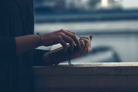 Female hands on diary Stock Photos