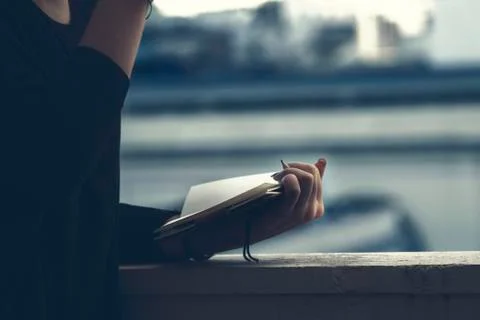 Female hands on diary Stock Photos