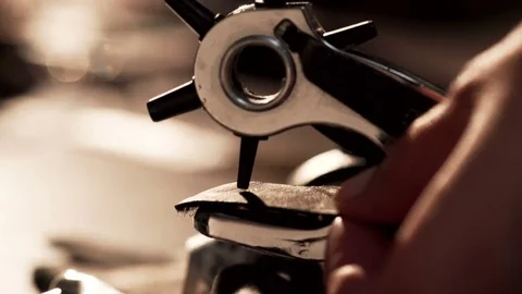 Female hands during handmade workshop with leather, using special instruments Stock Footage 77414063