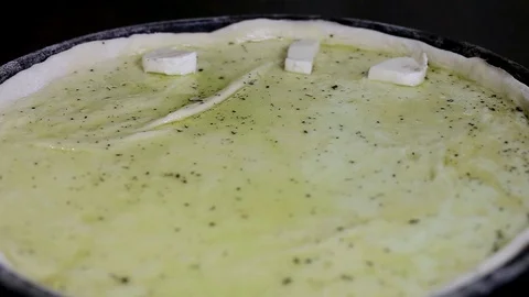 Female hands in gloves lay out mozzarella on rolled out dough Stock Footage 101201718
