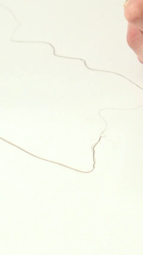Female hands with a graphite pencil.  Stock Footage 290035256