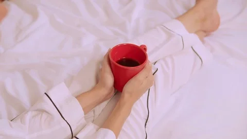 Female hands hold mug Stock Footage 125945925