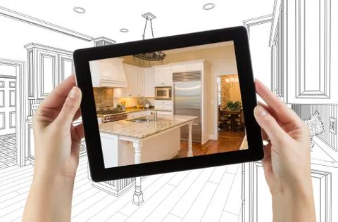 Female Hands Holding Computer Tablet with Kitchen on Screen &amp; Drawing Behind. Stock Photos
