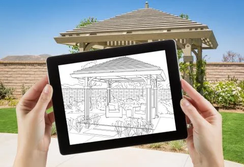 Female Hands Holding Computer Tablet with Drawing of Pergola on Screen, Photo Stock Photos