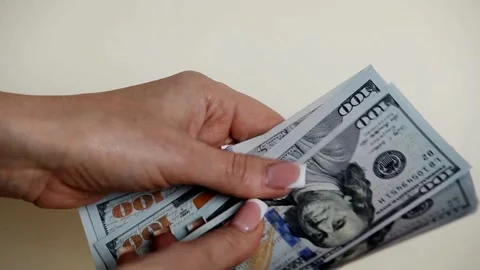 Female hands holding dollar money cash, closeup. Businesswoman hands counting Stock-Footage 336260053