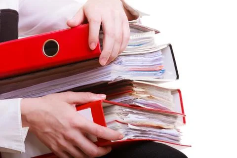 Female hands holding stack folders documents. overworked business woman. 写真素材