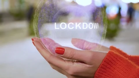 Female hands holding text Lockdown Video stock 153011509