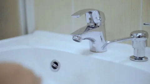 Female hands include water Stock Footage 74026459