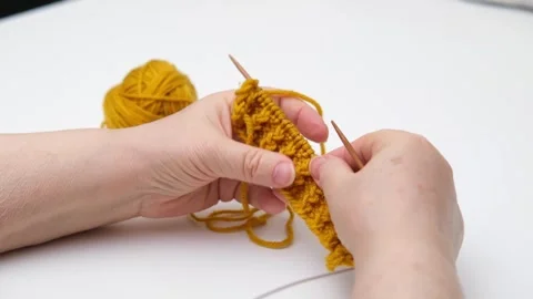 Female hands knitting close-up Stock Footage 286970417