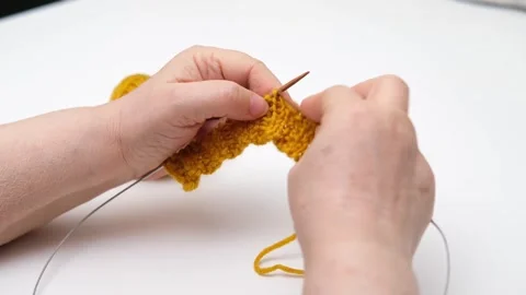 Female hands knitting close-up Video stock 286971055