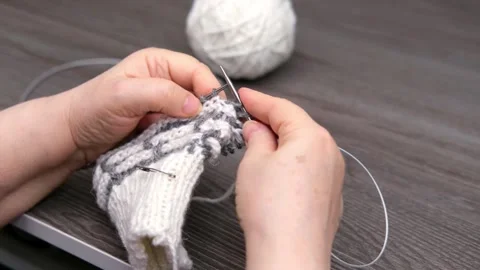 Female hands knitting close-up Video stock 287432242
