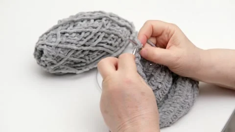 Female hands knitting close-up Video stock 288191942