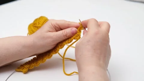 Female hands knitting close-up Video stock 288192605