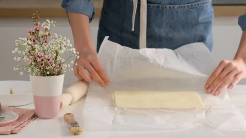 Female hands make puff yeast dough at home kitchen. Stock Footage 128074575