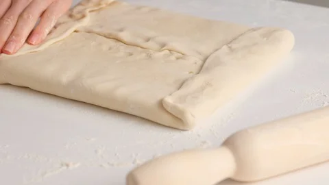 Female hands make puff yeast dough at home kitchen. Stock Footage 128074625