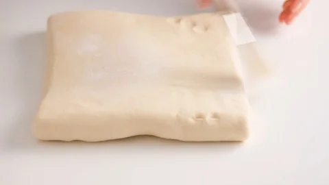 Female hands make puff yeast dough at home kitchen. Slow motion food. Stock Footage 128074986