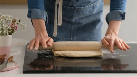 Female hands make puff yeast dough at home kitchen. Stock Footage 128075411