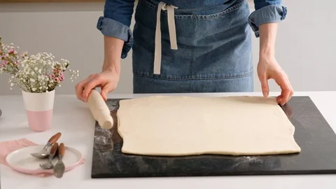 Female hands make puff yeast dough at home kitchen. Slow motion food. Stock Footage 128075562