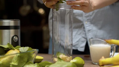 Female hands making smoothies Stock Footage 127613861