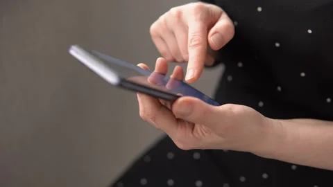 Female hands with mobile phone texting searching something in internet side view Video stock 240968255