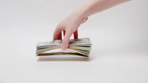 Female hands move stack of dollar bills and showed money Stock Footage 220324275