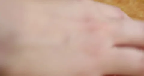 Female hands with multi-colored manicure chop bell pepper  to the salad Stock Footage 133832402