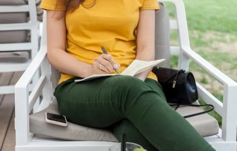 Female hands with notebook Stock Photos