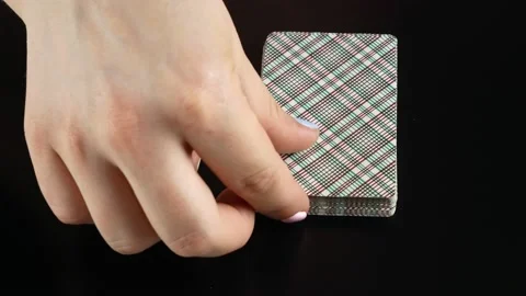 Female hands playing solitaire.Card deck on a black background. 스톡 동영상 132968966
