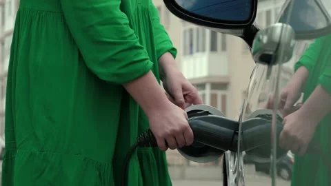 Female hands plugging in cable Stock Footage 194431088