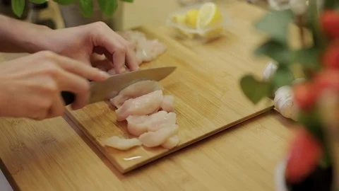 Female hands prepare meat. Stock Footage 118949759