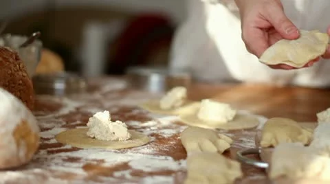 Female hands preparing dumplings, tracking shot Stock Footage 10735302