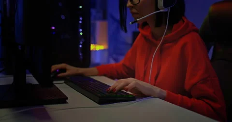 Female hands press the computer keyboard, fingers press the buttons. Illuminated Stock Footage 154358898