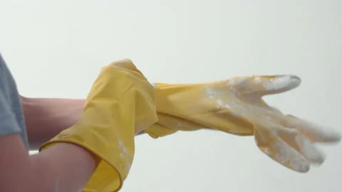 Female hands put on construction gloves Video stock 166609905