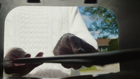 Female hands put several letters in the mailbox. POV video from inside the box Stock Footage 82776017