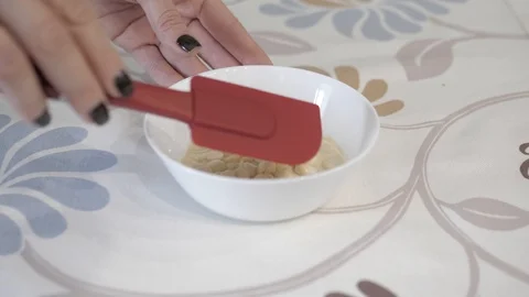 Female hands remove from the frame a white cup with chocolate, close-up Video stock 126314331