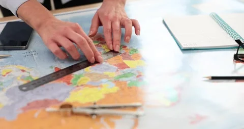 Female hands with ruler on world map Stock Footage 256410271