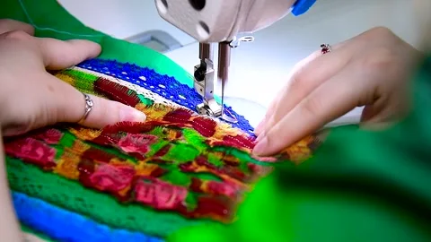 Female hands on sewing machine. Close up of seamstress work. Stock Footage 321241806