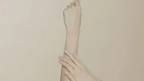 Female hands on simple background Stock-Footage 102261385